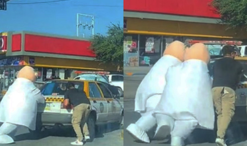 Ni Batman ni el Chapulín Colorado… botargas de Simi empujan un taxi Ni Batman ni el Chapulín Colorado… botargas de Simi empujan un taxi